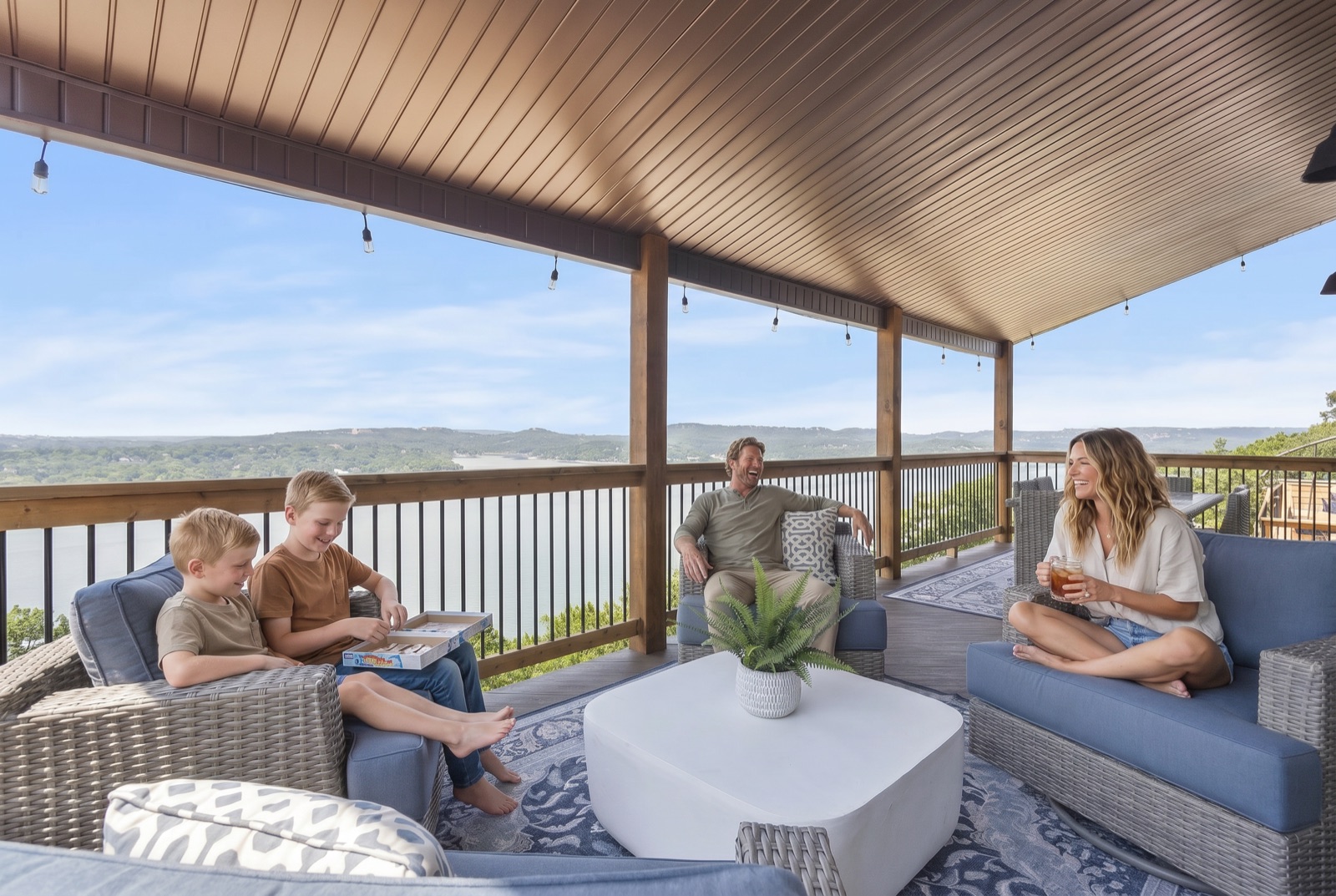 Family enjoying a covered patio at a short-term rental